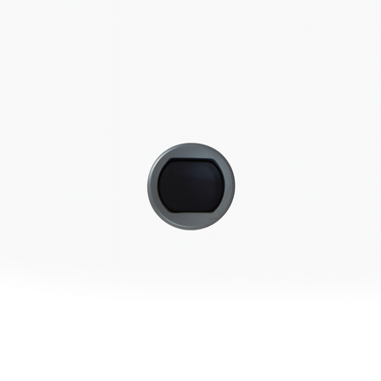 Round black object with a metallic rim on a white background