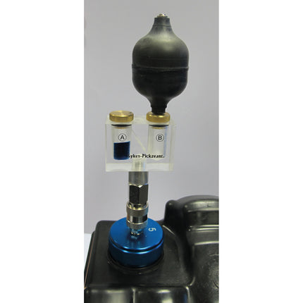 xl combustion leak testers shown attached to a cooling cap on a header tank