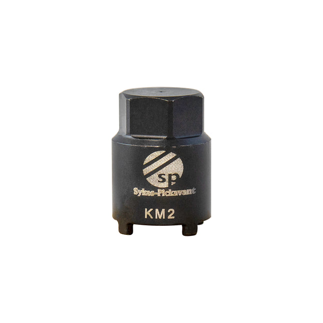 A black KM 2 socket designed for tightening and loosening of lock nuts, used in vehicle maintenance.